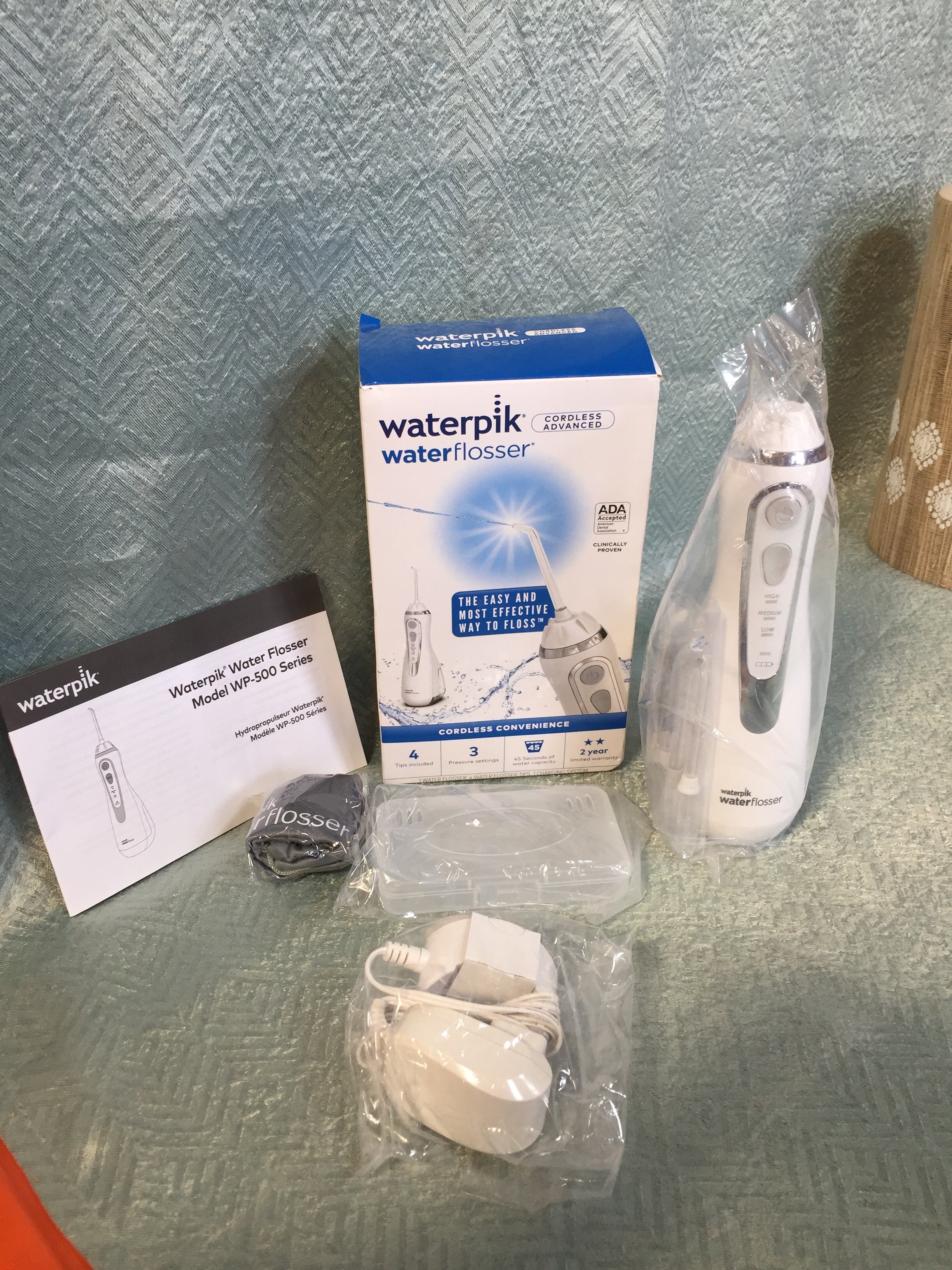 Waterpik Cordless Advanced Water Flosser 4 Tips, Portable White WP-560 (7545516753134)