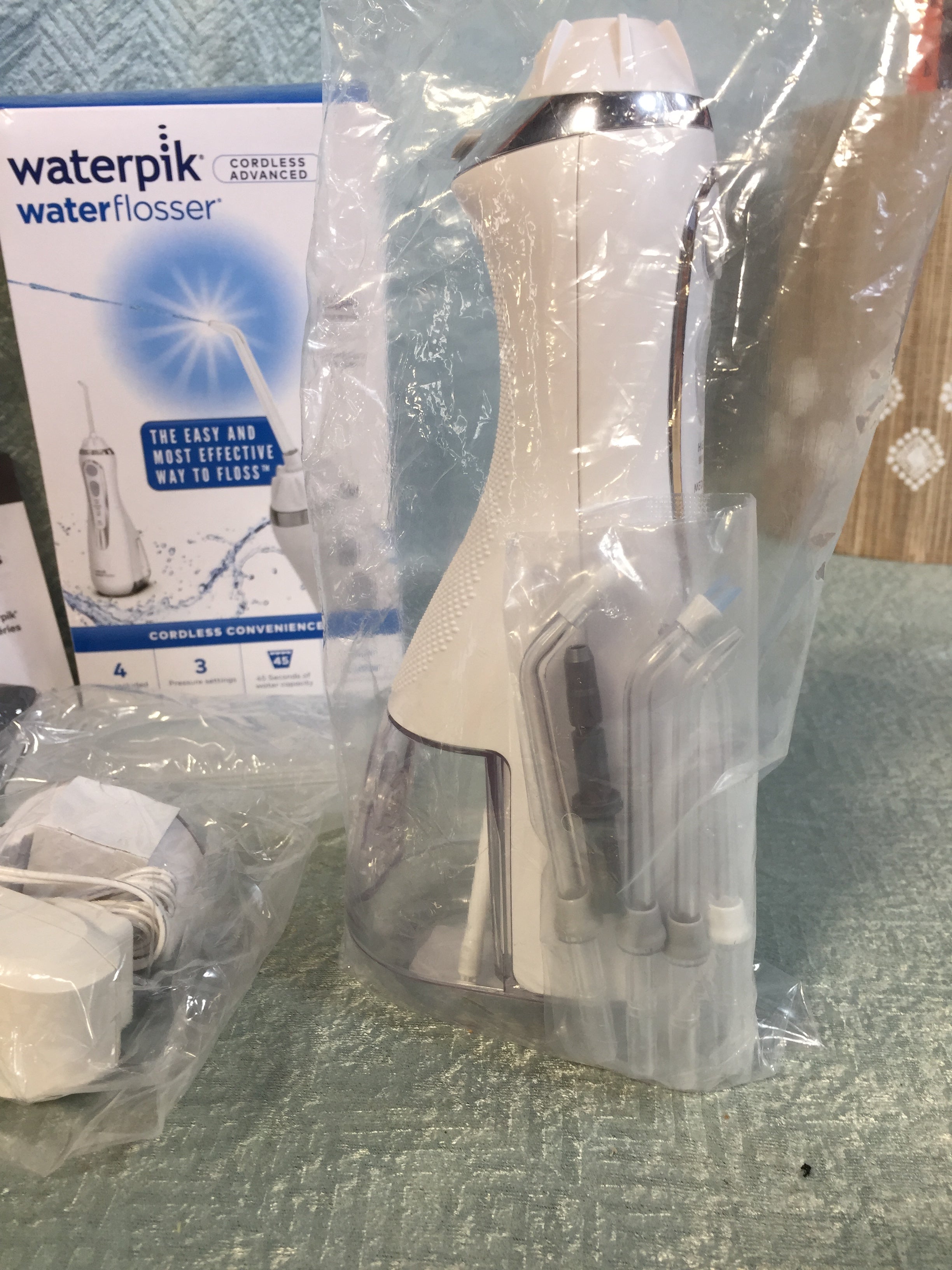 Waterpik Cordless Advanced Water Flosser 4 Tips, Portable White WP-560 (7545516753134)